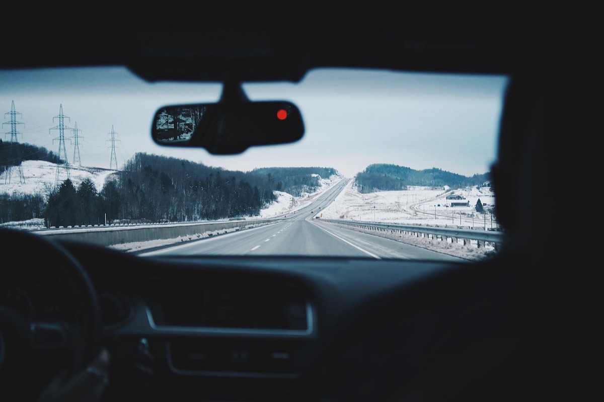 Rental car driving on island road