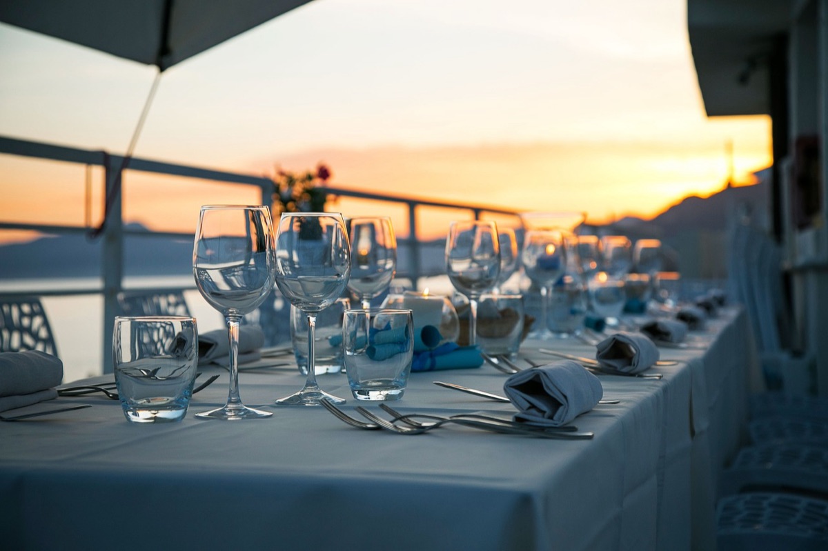 Couple dining outdoors at luxury resort