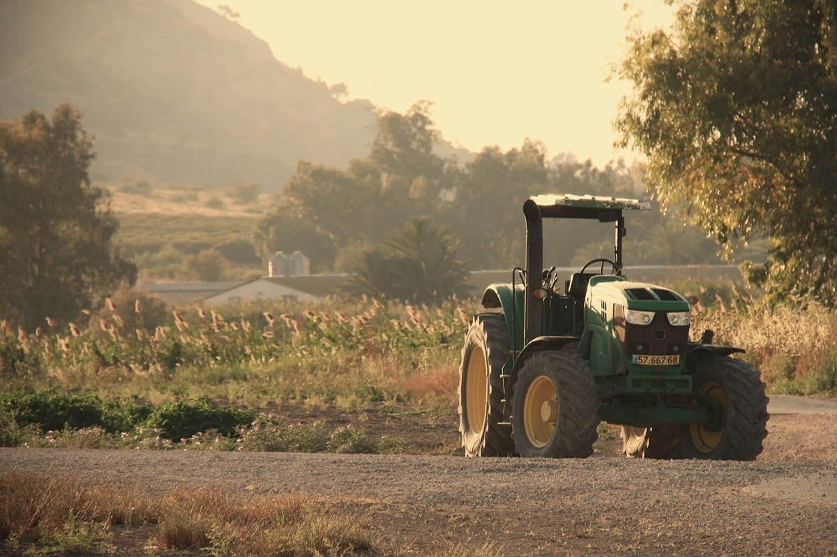 Mauritius agriculturale field with crops and farm equipment